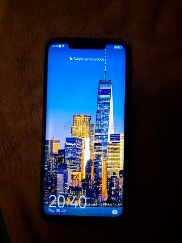 Used smartphone with full-screen display - good condition