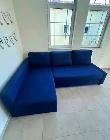 Blue L-Shaped Sofa Bed with Storage