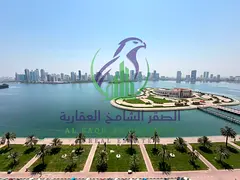 Four bedroom apartment with living room for annual rent in Al Majaz 3 Sharjah free air conditioning