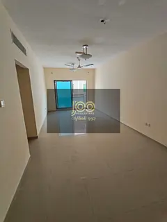 Two-bedroom apartment with a living room, opposite Umm Al Quwain Mall.