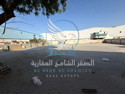 Special offer for rent: an industrial yard in Industrial Area 13, strategically located on the main road