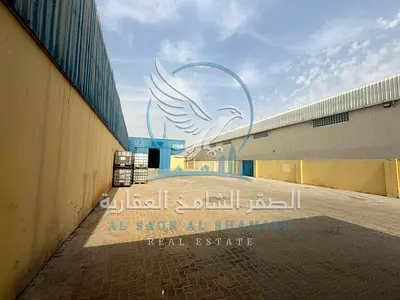 حوطة للإيجار في الصناعية 18 | 10,000 قدم مربع | شارع رئيسي | مكاتب + مستودع مغطى