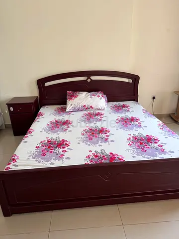 King size bed with mattress and side table