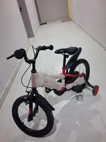 2 months used Tidyboy 16" Red and Black Kids Bicycle with Training Wheels.