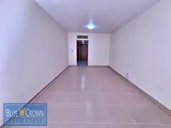 Dewa free studio balcony ! With parking ! Brown interior