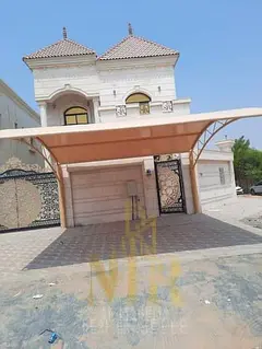 Corner villa in Al Muwaihat 1, price includes water, electricity, and air conditioning - negotiable 