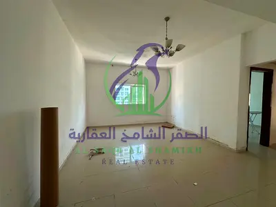 شقة غرفة وصالة للإيجار السنوي في التعاون بإمارة الشارقة بدون تأمين مع شهر مجاني 2 حمام بلكونة تشطيبات حديثة مساحات واسعة