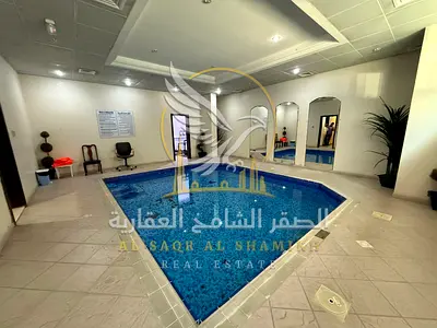 Largest Two BHK free gym pool And sandy parking near Al Heera Beach.