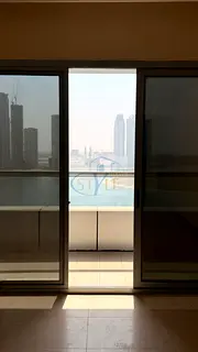 Two-bedroom apartment for sale in Al Khan, featuring a detailed view of Al Khan Lake and another vie