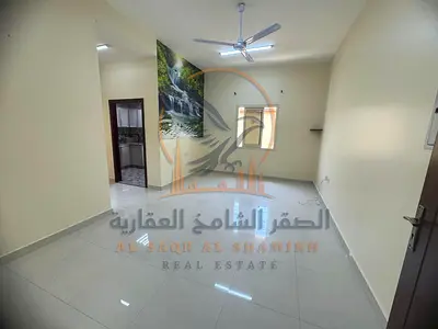 Annual 1-bedroom apartment for rent in a new building in Al Mowaihat near Dubai exi with balcony flexible payment up to 6 cheques