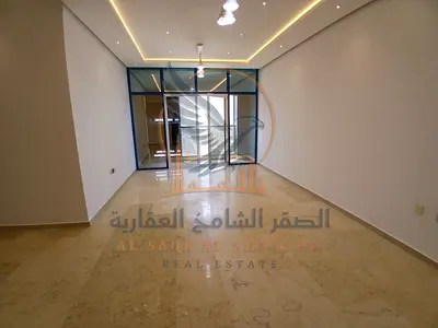 Two-bedroom apartment with a living room in Al Nuaimiya 3 Ajman for annual rent Features a balcony with an open view and private parking Prime locatio