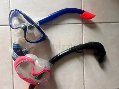 Two snorkel mask and snorkel sets - good condition