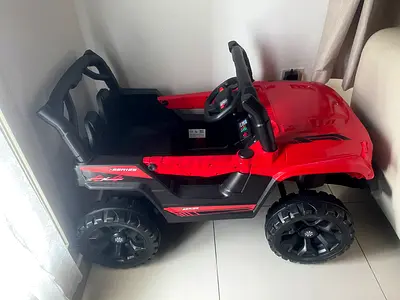 Red Electric Ride-On Jeep for Kids - 4 Wheels, Remote and charger ready
