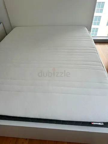 Ikea Queen size bed w/ mattress & nightstand in excellent condition - clean and lightly used