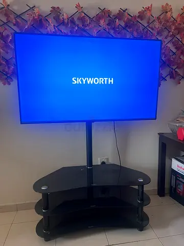 Skyworth 55-inch LED SMART TV with glass TV stand - good working condition