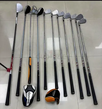 Set of 11 Golf Clubs with Headcovers - Mix of Drivers, Irons and Wedges