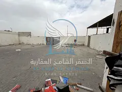 Open Yard for Rent in Al Sajja Size: 10,000 sq ft Access: Easy truck entry and wide open space for m