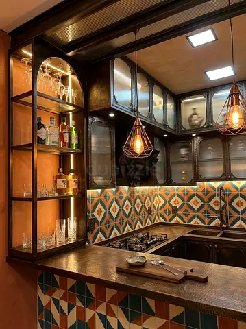 Compact vintage-style wooden kitchen with tiled backsplash and bar shelf