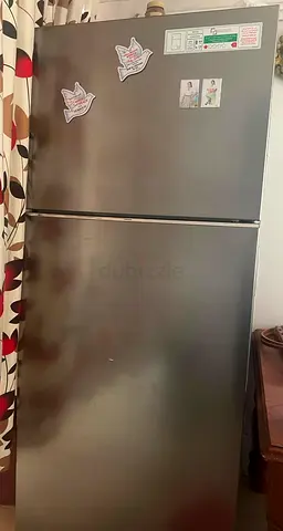 Silver double-door refrigerator - good working condition