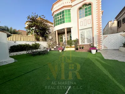 Distinctive villa for sale in Al Rawda 2 – Ajman | Land area 5,000 sq ft | 5 master bedrooms | Majlis and living room | Kitchen + preparation kitchen