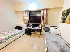 bed space available in a master room to be shared with 2 tenants with attached washroom in JVC