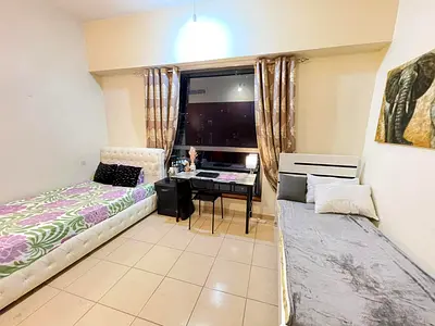 bed space available in a master room to be shared with 2 tenants with attached washroom in JVC