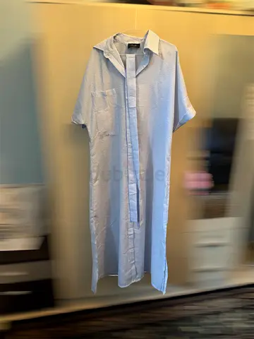 Light blue long button-down shirt dress, size likely S/M
