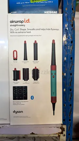 Dyson Airwrap i.d. styling tool with multiple attachments