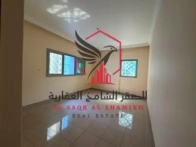 اكبر غرفتين وصالة مع تكييف مجاني + باركن + جيم ومسبح مجانا اطلالة مفتوحة 2 بلكونة للايجار في المجاز 3