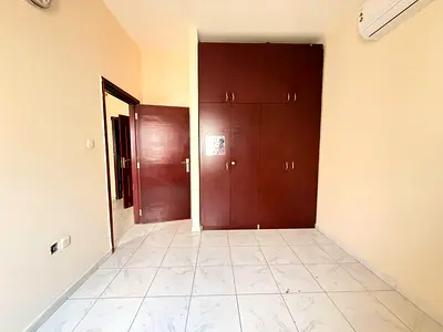 CHEAP PRICE 1BHK WITH WARDROBE ON ROAD BUILDING IN MUWAILEH