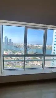 2-bedroom apartment with a living room for sale in Al Majaz 1 with a direct view of the Lake Cornich