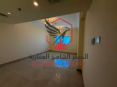 The cleanest two-bedroom apartment with a living room in Al Majaz 2. Free parking and one month free