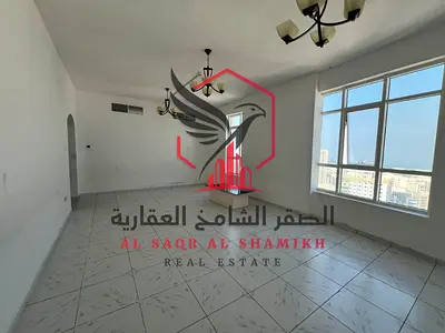 Sea view, cheapest two-bedroom apartment with a living room, panoramic view, spacious, easy access to Dubai, for rent in Al Majaz 3