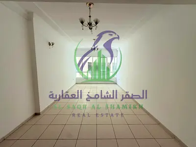 Two bedroom apartment for annual rent in Al Taawun Sharjah balcony open view built in wardrobes large hall free gym swimming pool three bathrooms