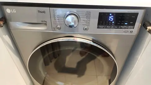 LG ThinQ Front Load Washing Machine 10/7kg - Silver, Working Condition
