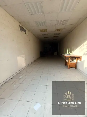 محل تجاري للإيجار السنوي في الراشدية 1 عجمان بـ 60,000 درهم | مساحة 1500 قدم بالميزانين شارع رئيسي حيوي جاهز و4 دفعات وتأمين كاش قريب من جميع الخدمات