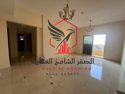 Apartment for annual rent - Al Majaz 3, free parking, spacious areas, open view, free maintenance, central air conditioning, prime location close to