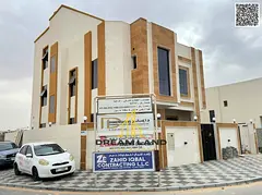 Direct from the owner, a villa in one of Ajman's most luxurious villas, built and finished to a supe