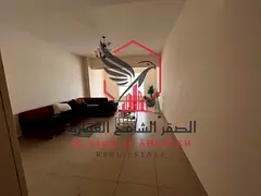 Spacious Annual Apartment for Rent in Al Majaz 1 | 2 Bedrooms | Large Living Room | Open View | Free