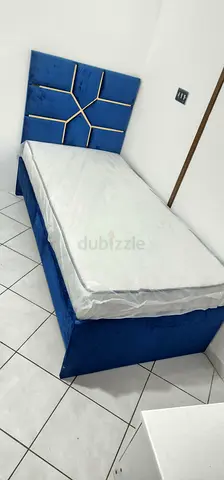 New Blue upholstered single bed with mattress and mattress