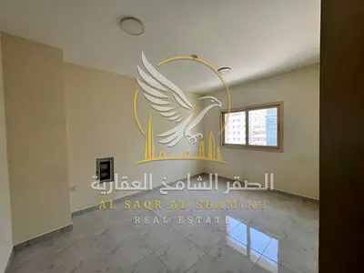 غرفة وصالة عزاب بمنطقة البوطينة بناية جديدة مساحة واسعة تكييف مركزي تشطيب نظيف جاهز للسكن ف منطقة حيوية وقريبة من جميع الخدمات العامة