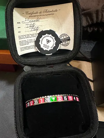 Roulette-themed numbered bracelet in case