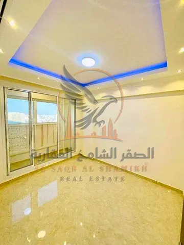 For annual rent in Ajman a three-bedroom apartment with a living room in Al Rawda 3 featuring a spacious layout elegant design and a prime location