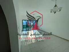 Cheapest two-bedroom apartment with a large balcony and free parking for annual rent in Al Qasimia, 