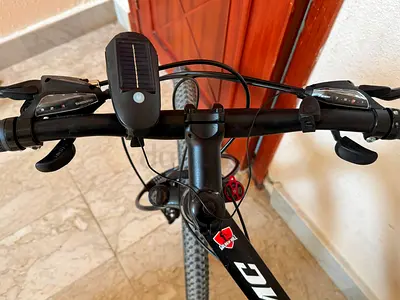 Used adult mountain bike - good condition, Shimano gears, solar front light