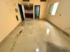 Premium studio apartment with separate kitchen – spacious – AED 18,000 per year – prime locati