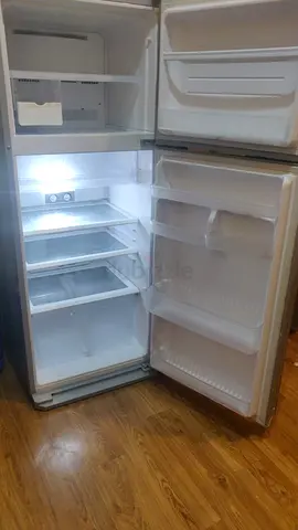 Used double-door refrigerator with freezer - good working condition