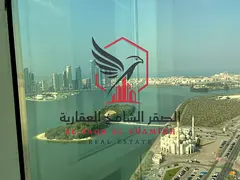 2 BHK Khalid Lake and Al Majaz Corniche View Free AC Free Parking Free Gym and Pool Laundry Room 1 M