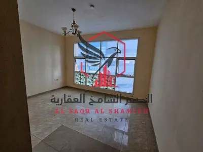 Cheapest two-bedroom apartment with a sea view, master bedrooms, spacious layout, easy access to Dubai, for rent in Al Majaz 3