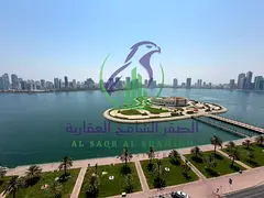 Two bedroom apartment with living room for annual rent in Al Majaz 3 Sharjah free air conditioning f